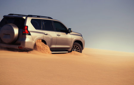 Stuck SUV in remote Namib Desert sand, editorial capture highlighting the reality of rugged driving conditions and desert exploration in Namibia.の写真素材