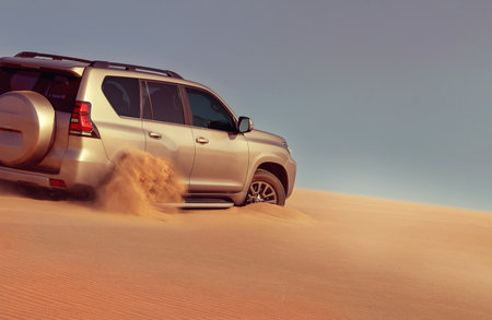 Stuck SUV in remote Namib Desert sand, editorial capture highlighting the reality of rugged driving conditions and desert exploration in Namibia.の写真素材