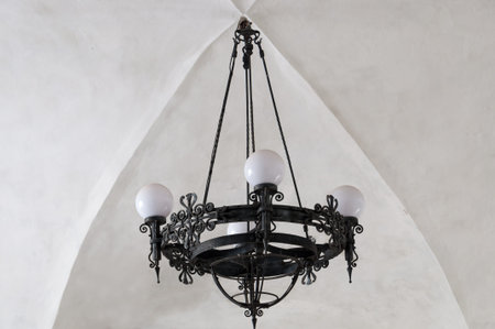 Chandelier of metal on the ceiling of the old buildingの写真素材