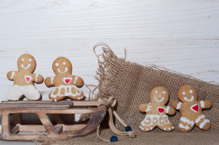 cookies in the shape of a little man near sledの写真素材