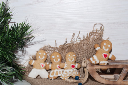 cookies in the shape of a little man near sledの写真素材