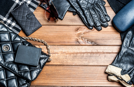 Stylish clothes and accessories on wooden boardsの写真素材