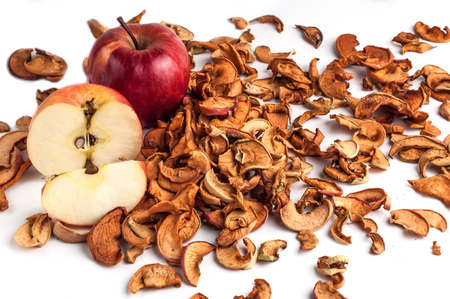 Dried apple slices on the plate on a white backgroundの写真素材
