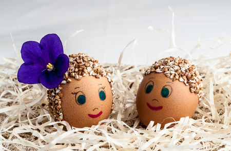 decorative Easter eggs handmade boy and girlの写真素材