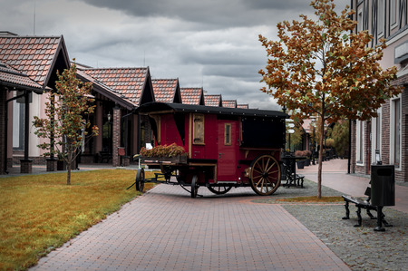 decorative part of an old train on a city street on a cloudy dayの写真素材