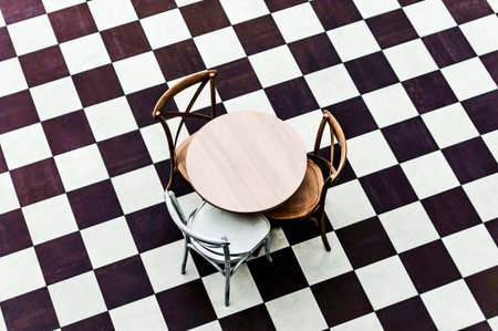 modern chair for interior design and a table on a chessboard floorの写真素材