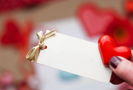 little greeting card with a bow with Valentine's day