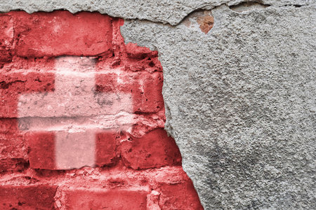 Flag of Switzerland on brick wall. Swiss National Day.の写真素材