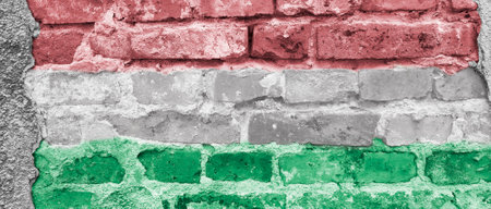 Banner with the flag of Hungary on a brick background.の写真素材