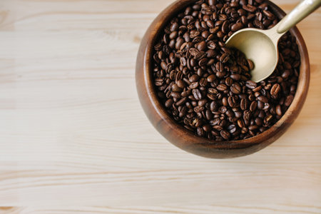 coffee beans in a wooden plateの写真素材