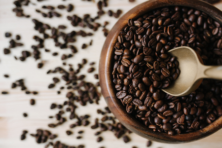 coffee beans in a wooden plateの写真素材