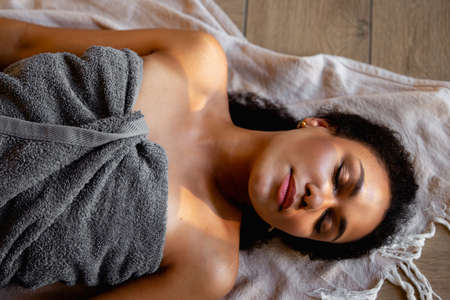 beautiful girl relaxing in spaの写真素材