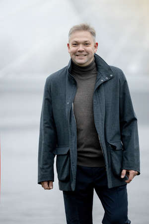 adult male portrait on the street lightの写真素材