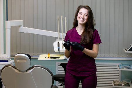 beautiful woman doctor with dental equipment in dentistryの写真素材