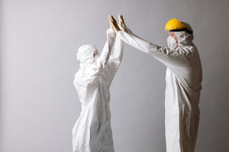 Two professional doctors together fighting against COVID-19 or coronavirus.の写真素材