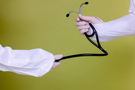 Two professional doctors together fighting against COVID-19 or coronavirus.の写真素材