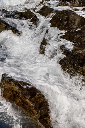 LaDigue Stones Rocky Beach Ocean powerの写真素材