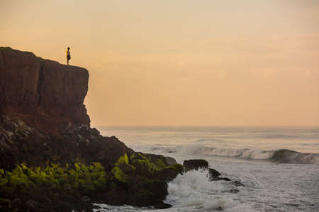 VARKAL, KERALA, INDIA - January, 20: A fisherman looks at the sea at dawn January, 20, 2015 in Kerala, Indiaのeditorial素材