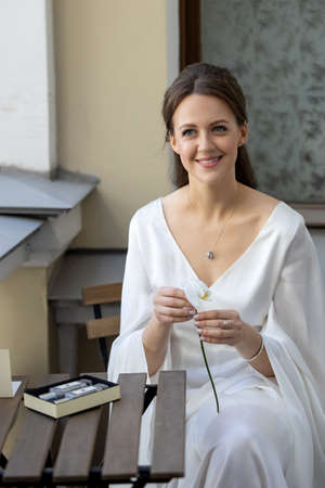 Beautiful elegant bride in a simple white wedding dress, wedding dress-combinationの写真素材