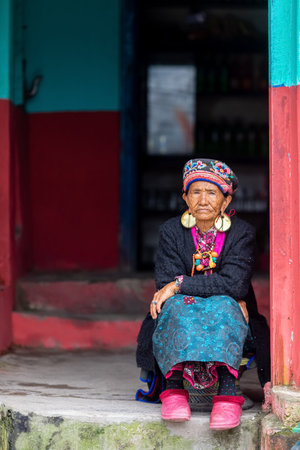 Nepalese woman in the mountains of the Himalayas. Village Na . Nepal. April 27, 2018