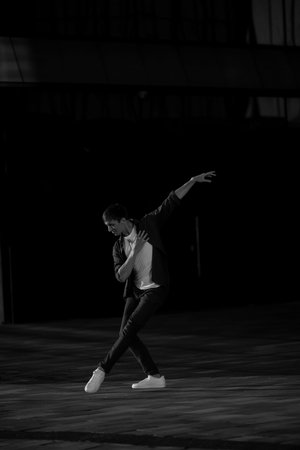 Summer activity and energy. Ballet dancer. Handsome man workout and stretching. fitness Coach and...