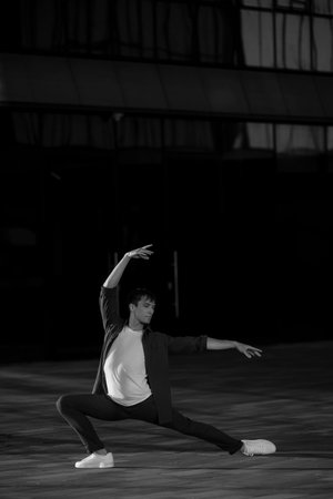 Summer activity and energy. Ballet dancer. Handsome man workout and stretching. fitness Coach and...