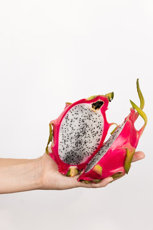 Pitaya. Dragon fruit. Colorful, healthy morning breakfast made to eat and enjoy a meal with friends. Fresh, organic fruit for health, vitality and wellness. A bright diet food spread to start the day.の写真素材