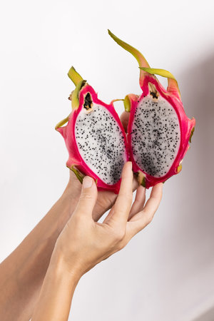 Pitaya. Dragon fruit. Colorful, healthy morning breakfast made to eat and enjoy a meal with friends. Fresh, organic fruit for health, vitality and wellness. A bright diet food spread to start the day.の写真素材