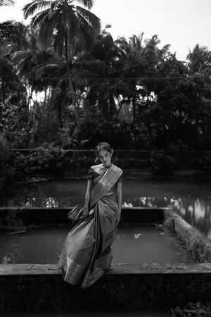 Bride. Beautiful young caucasian woman in traditional indian clothing with bridal makeup and...