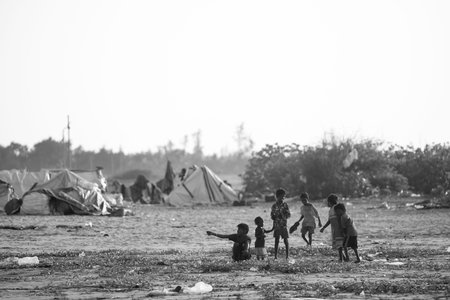 February 14, 2023, Chennai city, India: Nomadic people of India in their traditional clothes, against the backdrop of their place of residence.のeditorial素材