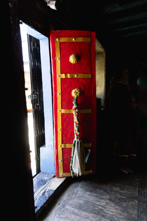 A red door at a Buddhist monastery in Tibet.の写真素材