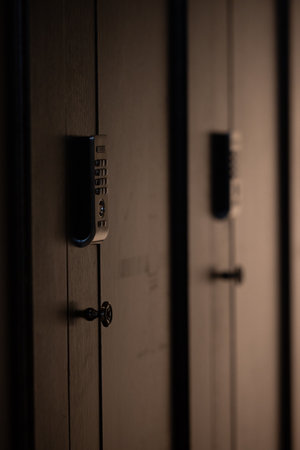 Modern electronic combination locks in an ultra-modern sports club in a big city. Storing thingsの写真素材