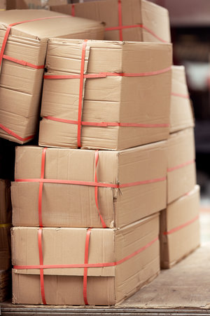 Using cardboard for packaging during transportation. Paper boxes.の写真素材