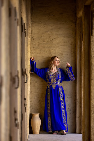 A European woman in an Arab national costume.の写真素材