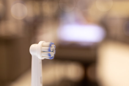 Electronic Toothbrush Head close-up on a blurry background: an innovative toothbrushの写真素材