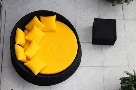 The bright yellow round sofa takes center stage in this top-view arrangementの写真素材