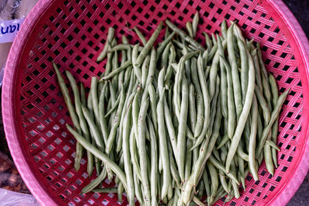 Fresh green beans stall in the vegetable market. natural fresh productの写真素材