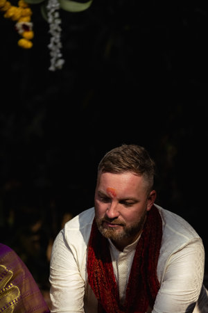 A man participates in his wedding ceremony.の写真素材