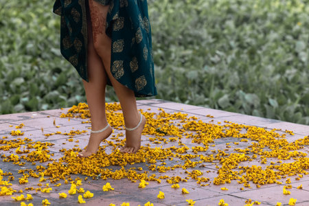 A girl is dancing an Indian dance during a tourist trip through vibrant India.の写真素材