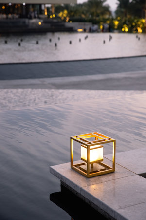 Decorative lantern. Street decor illuminated by the setting sun.の写真素材