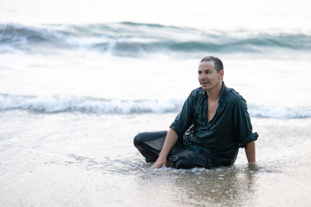 A man is carelessly swimming in the ocean.の写真素材