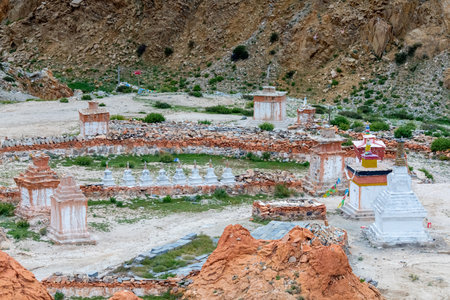 Ancient nameless temple complex in the remote highlands of Tibet. Mysterious spiritual architecture surrounded by mountains and sacred silence.の写真素材