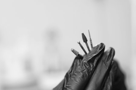 Close up view of specialized drill bits and heads for podology equipment used by medical...
