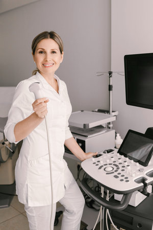 female doctor working in gynecology office with equipment