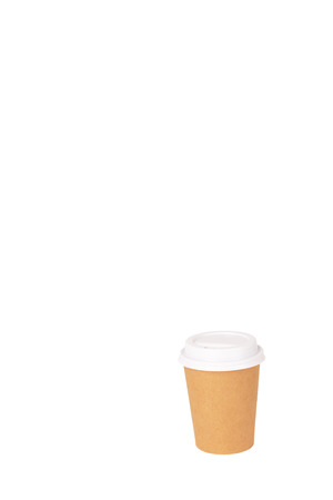 A craft cup of coffee to go isolated on white. Take away coffee concept. Copy-space for your text.の写真素材
