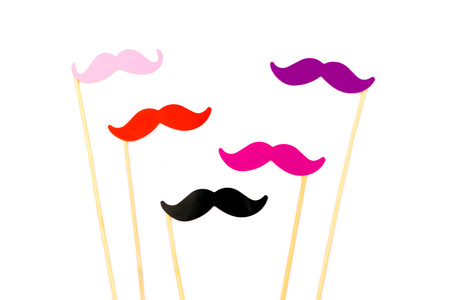 Set of moustache photo booth props isolated on the white background. Flat-lay, top view.の写真素材