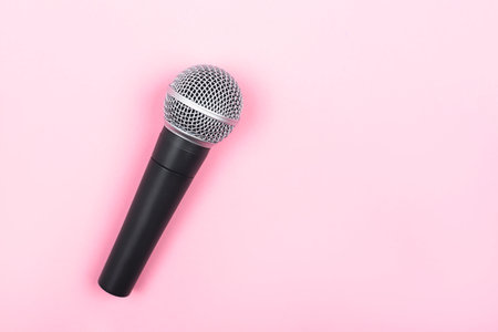 A microphone on pink background. Minimal compostion.の写真素材