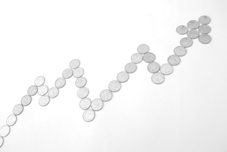 The composition of arrows with coinsの写真素材