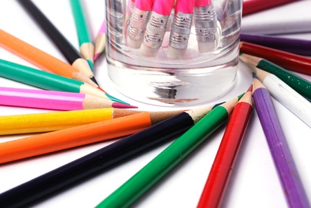 Color pencils in arrange in color wheel colors on white backgroundの写真素材