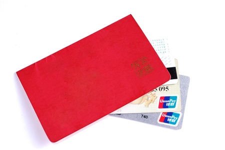 Bank card and passbook isolated on a white backgroundのeditorial素材